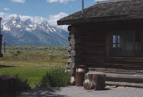 Enjoy breakfast behind small cabin, built in the 30s, vewing the Grand Tetons 